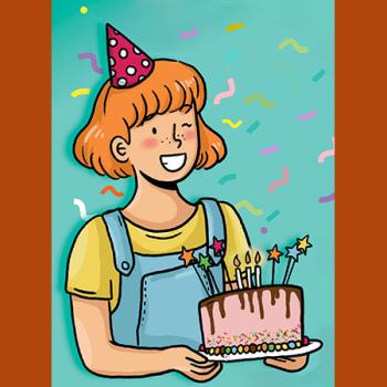 Une petite fille souriante tien gâteau d'anniversaire devant elle